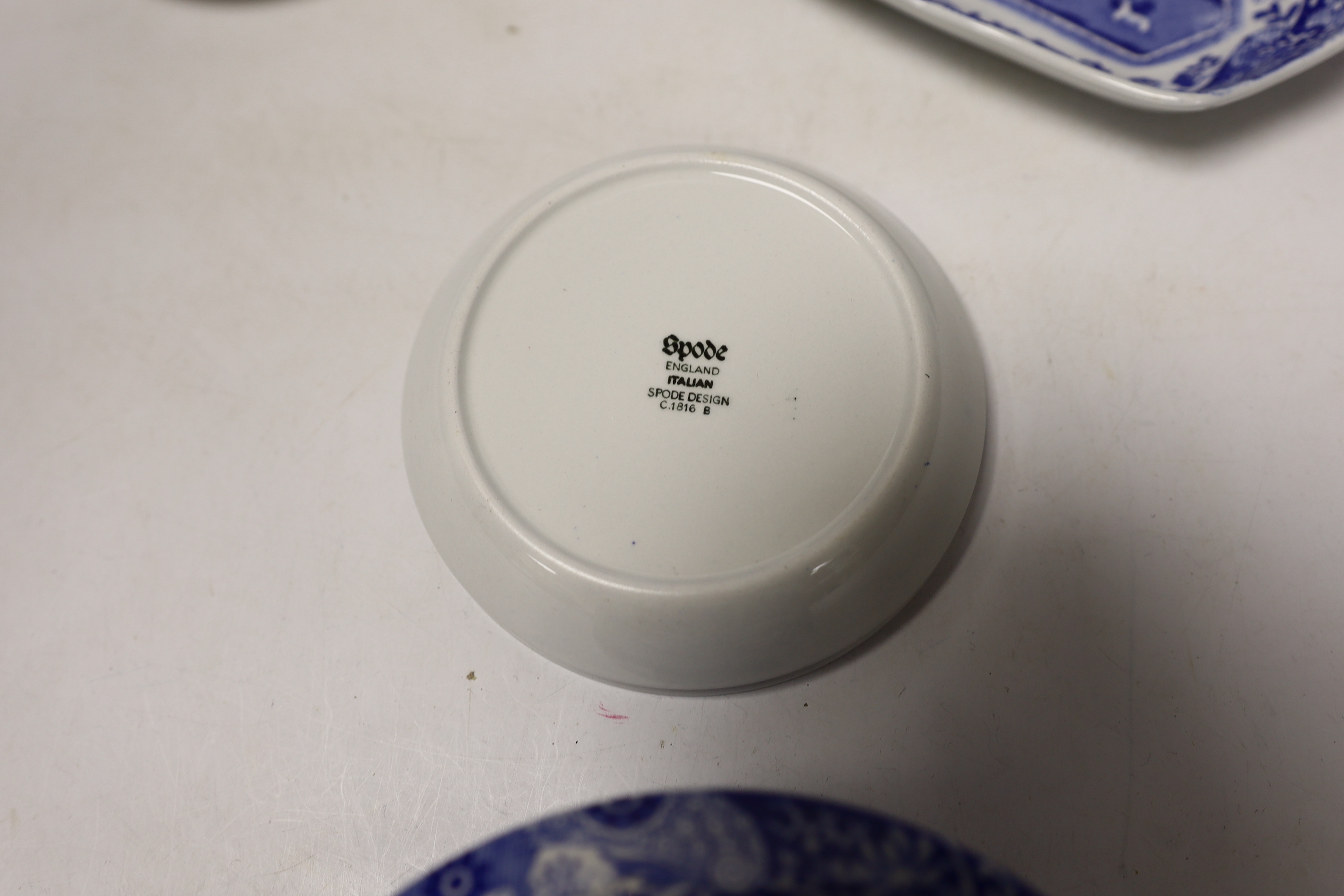 A collection of Spode Italian blue and white trinket boxes, dishes and two vases, (13)